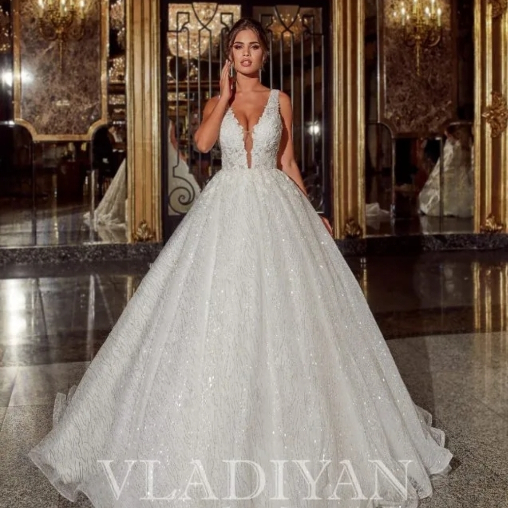 VladIyan White Sparkle Ball Gown Wedding Dress with Plunging V-Neck